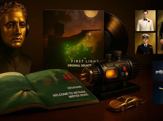 Collector’s Edition Mockup for 007: First Light, featuring a golden villain bust as centerpiece, a vinyl soundtrack, an open artbook with “Welcome to Vietnam, Mister Bond”, a high-tech device, and a small golden Aston Martin Valhalla keychain. Including digital goodies