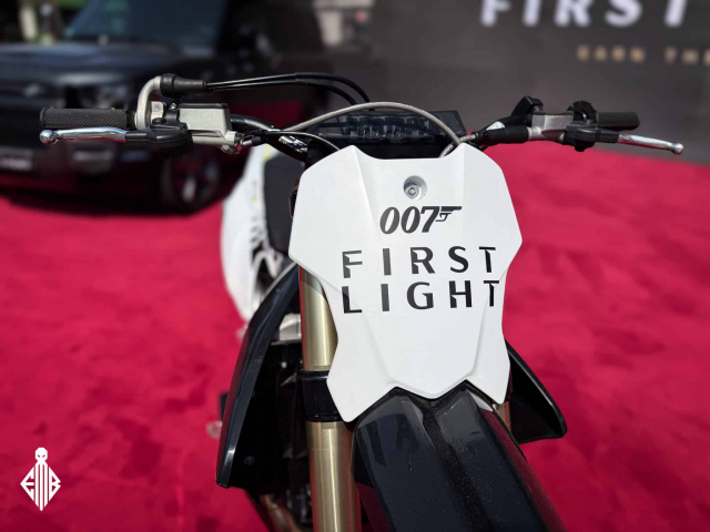 Triumph TF 250X motorcycle on display at the 007: First Light booth by IO Interactive during Gamescom 2025.