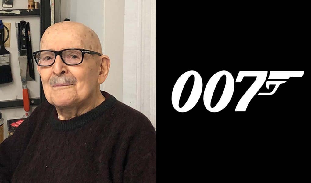 Photo of designer Joe Caroff next to his 007 Logo for James Bond