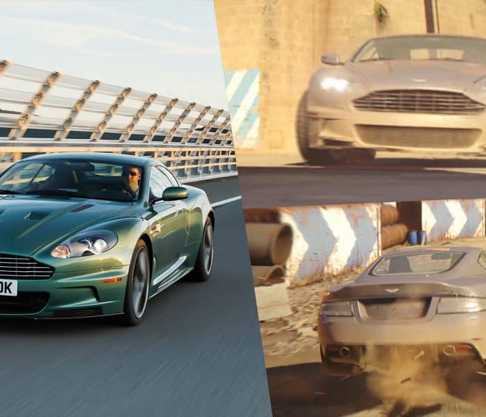 Aston Martin DBS in silver from 007 First Light Story Trailer driving through a Mediterranean harbor area, compared with a green production DBS on an open road.