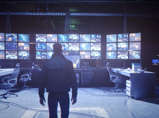 Bond enters a Webb Industries surveillance room filled with security camera screens in 007 First Light RTX trailer showcasing DLSS 4.5 and path tracing.